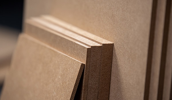 New wood fiberboard made from recycled fibers, produced using DIEFFENBACHER&rsquo;s Fiber2Fiber fiberboard recycling process.